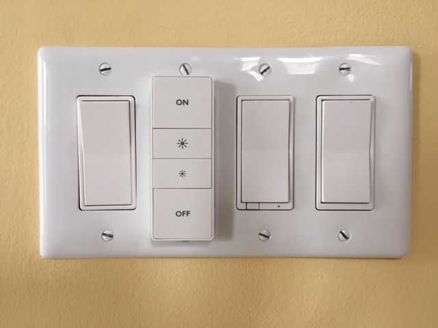 Hue Dimmer installed with 3 other switches